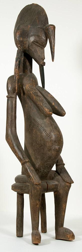 [Ancestral figure, seated pregnant woman]