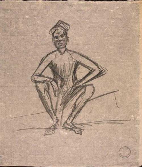 [Seated man with arms resting on knees]