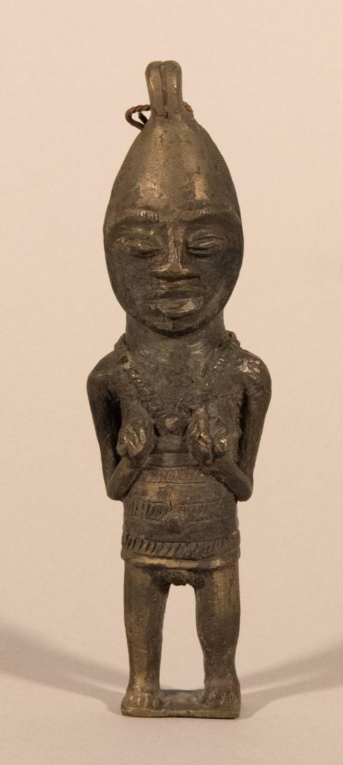 [Standing female figure]
