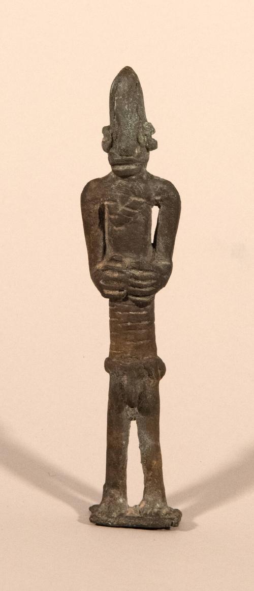 [Standing male figure]