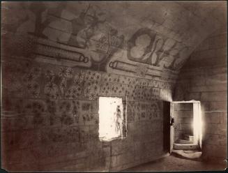 [Interior, wall with graffiti]