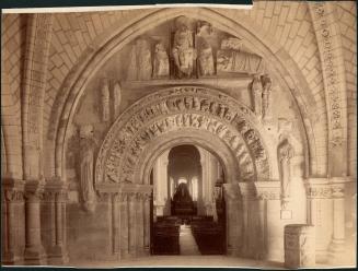 untitled [interior view of church, arches, statues, columns, and carvings]