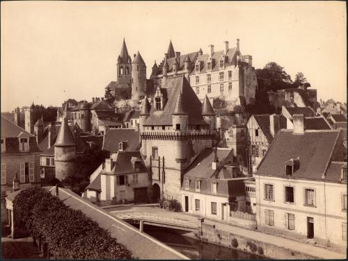 untitled [elevated view of city, sign in foreground “Laurent M [---] Vin”]