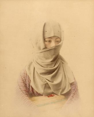 Portrait of a woman with covered head and face