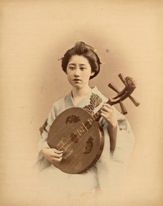 [Woman in green kimono with string instrument]