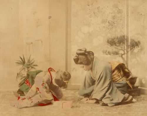 [Two women bowing]