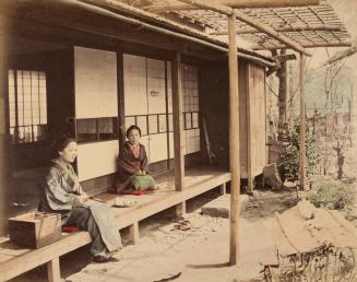 Two women on a porch