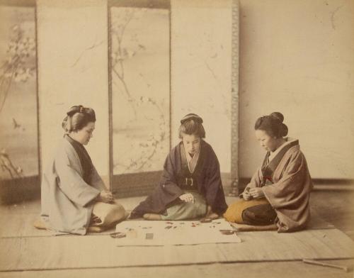 [Three women playing a game]