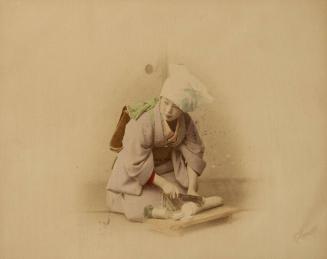 [Woman chopping vegetables]