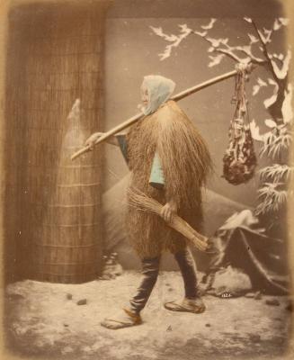 1326 Man in straw winter costume