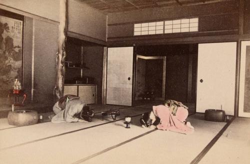 Two women bowing on tatami