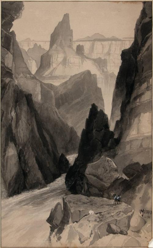 Figures in canyon landscape