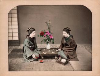 Two women playing go