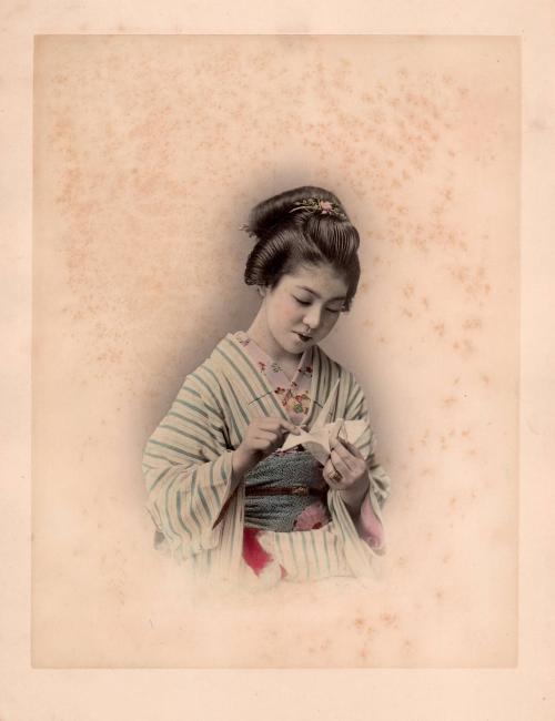 Girl with origami bird
