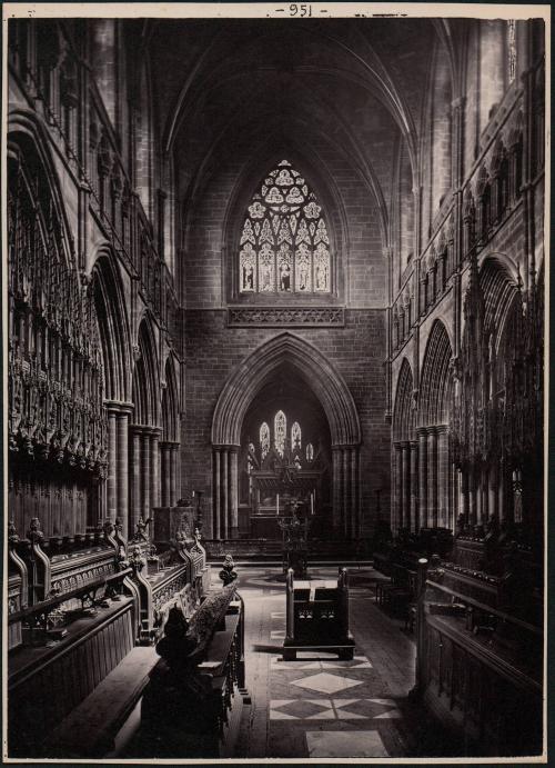 [Chester Cathedral interior detail, pews and window]