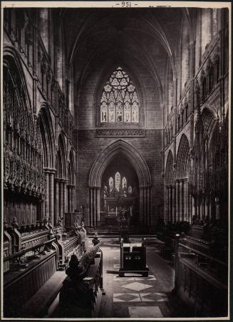 [Chester Cathedral interior detail, pews and window]