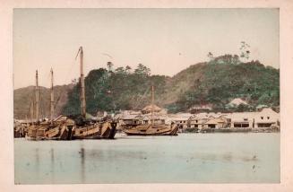 Seaside Village With Boat