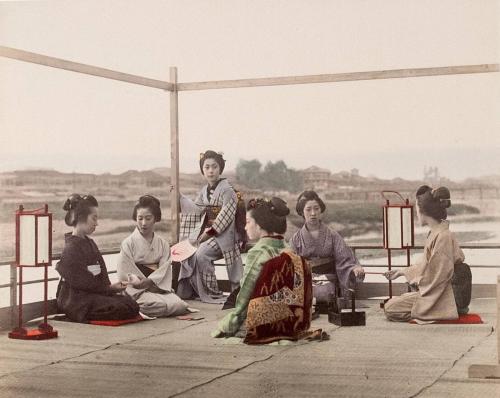 Group of Japanese Ladies Sitting on a Porch