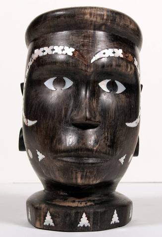 Carved Wooden Head with Mother of Pearl Inlay