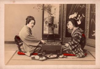 Two Women Playing "Go"