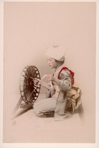 [Woman spinning cotton]