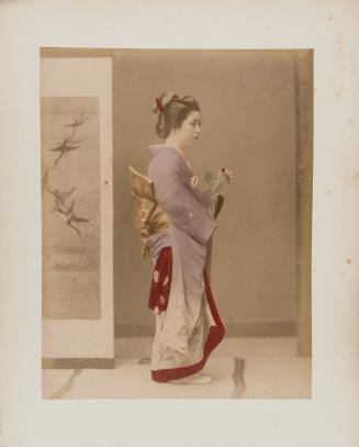 Standing Woman Holding Flower