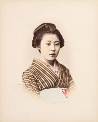 Woman with yellow and brown kimono