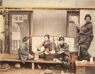 Four women, one playing the samisen