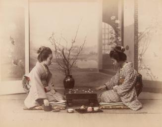 Two women playing Go