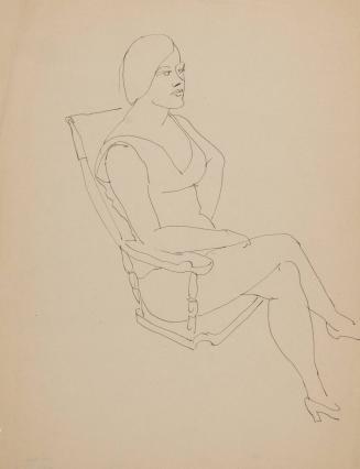 [seated female in armchair, right leg over left right arm rests on right leg]