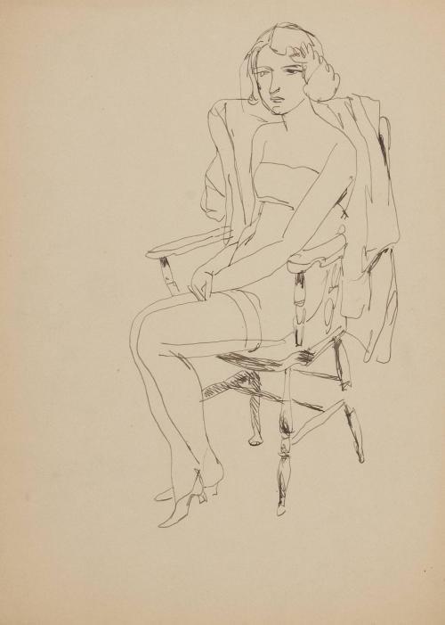 [seated female with legs crossed]