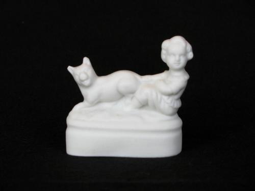 [Child pulling cat's tail parian figurine]