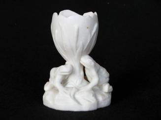 [Egg-shaped parian vase with high relief cat-tail designs and two frog ornaments]