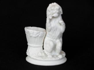 [Parian wheat sheaf spill vase with begging dog ornament]