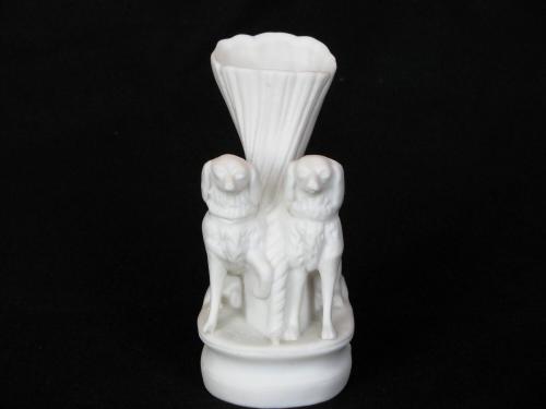 [Shell-shaped Parian vase with two dog ornaments]