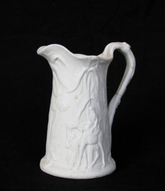 [Palm tree pattern parian pitcher with palm tree handle and interior glaze, high relief camel caravan and palm tree decoration and background mottling]