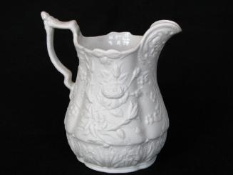 [Parian pitcher with high relief floral and quatre foil motif]