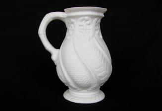 [Pear-shaped parian pitcher with segmented handle and interior glaze]