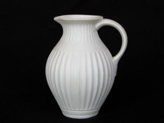[Bulbous parian pitcher with interior glaze, banded should and foot, and low relief fluting on neck and body]