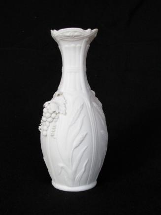 [Parian vase with scalloped lip, reeded neck, mottled body with wheat shafts and applied grape clusters]