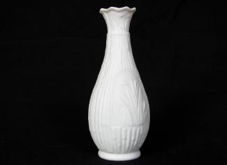 [Parian vase with interior glazing and scalloped lip, bamboo patterned body with stylized "window" of cat tails on mottled background]