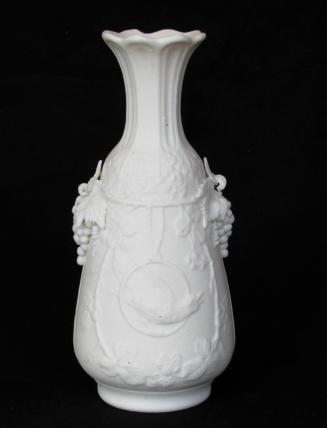 [Amphora-shaped smear-glazed vase with scalloped lip and fluting around neck, applied grape clusters at shoulder, high relief leaf, floral, vine with berries and song bird pattern on body with background mottling]