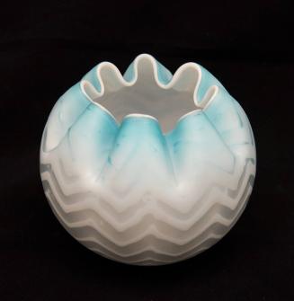 [Blue herringbone pattern globe vase with ruffled lip]