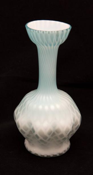 [Blue vase with cupped mouth and cylindrical neck]