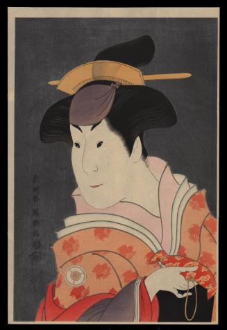 Kabuki actor holding small red purse