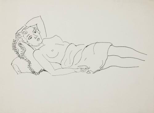 [Topless woman reclining on pillows]