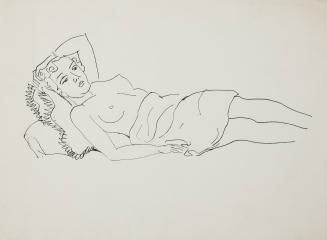 [Topless woman reclining on pillows]