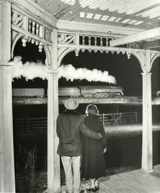 The Popes watch the last steam powered passenger train, Max Meadows