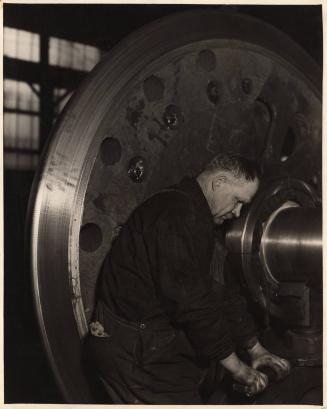 Mechanic (skilled) in a modern locomotive plant, 1930s