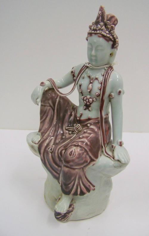 [Quan Yin figure]